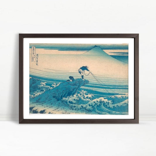 YF Fishing On Rugged Shore With Distant Mountain